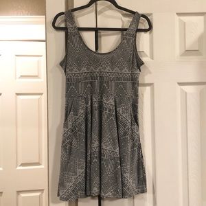 Gray “skater” dress with black geometric pattern
